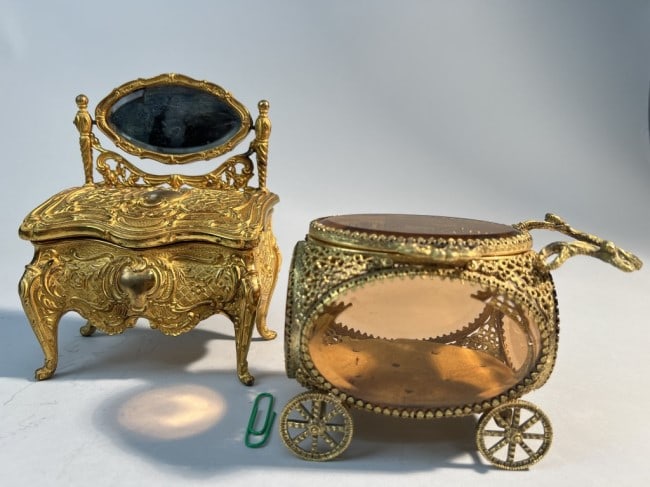 GROUP OF TWO STUNNING JEWELRY BOXES: One in the shape of a vanity table, and the other as a see through carriage.