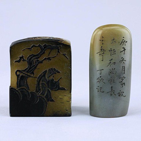 TWO CHINESE SOAPSTONE STAMPS: One with two color over-lay of amber and dark brown, the other with calligraphy on one side. H: 2 1/8 in.(5.5cm)