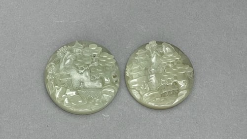 GROUP OF TWO CHINESE CARVED JADE PENDANTS