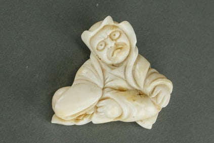 ANTIQUE CARVED STONE OKIMONO OF DARUMA