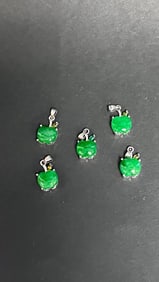 SET OF FIVE JADE PENDANTS