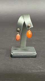 PAIR OF AMBER-COLORED EARRINGS
