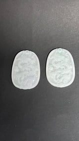 PAIR OF WHITE JADE PENDANTS