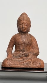 CHINESE FIGURE OF A SEATED BUDDHA