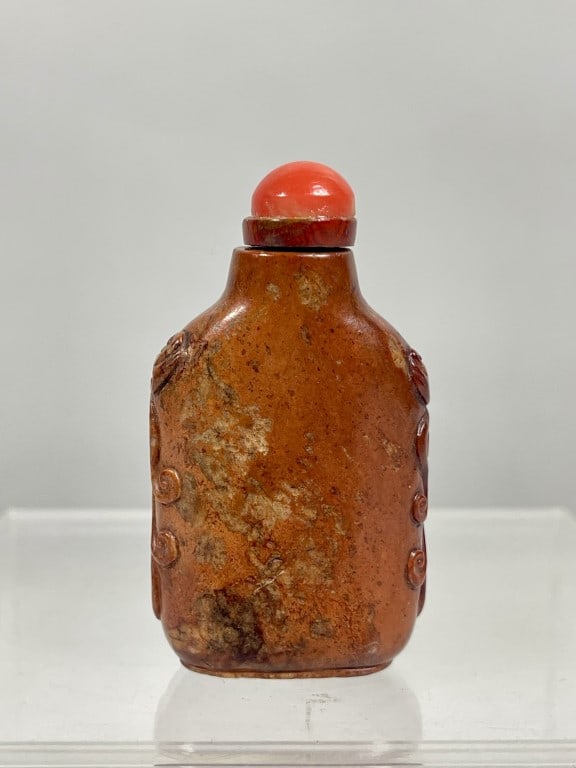 CHINESE CARVED REDDISH BROWN STONE SNUFF BOTTLE (1 of 3)