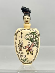 UNUSUAL CHINESE CARVED BONE SNUFF BOTTLE