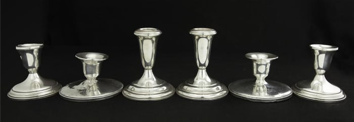 SIX STERLING SILVER CANDLE HOLDERS