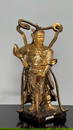 MODERN FIGURAL STATUE OF AN ASIAN WARRIOR GOD