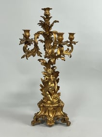 A GORGEOUS GILT-BRONZE CANDELABRUM