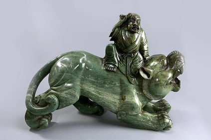 MASSIVE JADE FIGURAL GROUP OF LUOHAN ON A PIXIU
