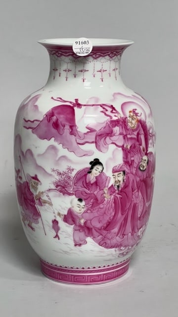 CHINESE OVOID PORCELAIN TABLE VASE: Depicting gods and goddess in flowy robes interacting with a fisherman and a boy, under a border of chain and pendants, all in pink hue. Inscription in black ink on the back panel. Mark on the base.