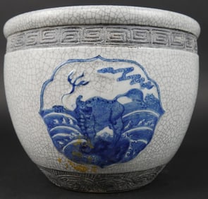 A BLUE AND WHITE CRACKLE JARDINIERE