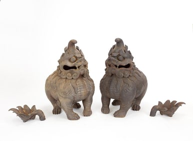 PAIR OF CHINESE CAST IRON FOO LION CENSERS