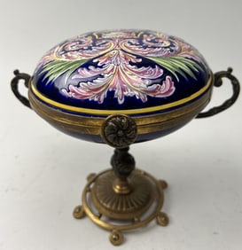 SMALL GILT BRONZE MOUNTED PORCELAIN CENTERPIECE