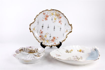 SET OF THREE GILT RIM PORCELAIN PLATES