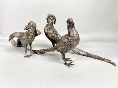 GROUP OF THREE SILVER-PLATED BIRD FIGURES
