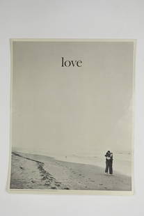 PHOTO PRINT BY LORIN GILLETTE: Titled "Love", a print photo that depicts a couple hugging on a beach. L: 17 1/2 in. H: 21 in.
