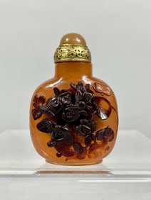 CHINESE CARVED AMBER SNUFF BOTTLE