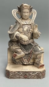 CHINESE CARVED BONE FIGURE OF A SEATED GENERAL