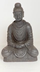 A CHINESE FIGURE OF A BUDDHA