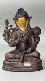 TIBETAN BRONZE FIGURE OF A SEATED BUDDHA