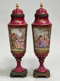 PAIR OF FRENCH SEVRES CRANBERRY RED GROUND VASES