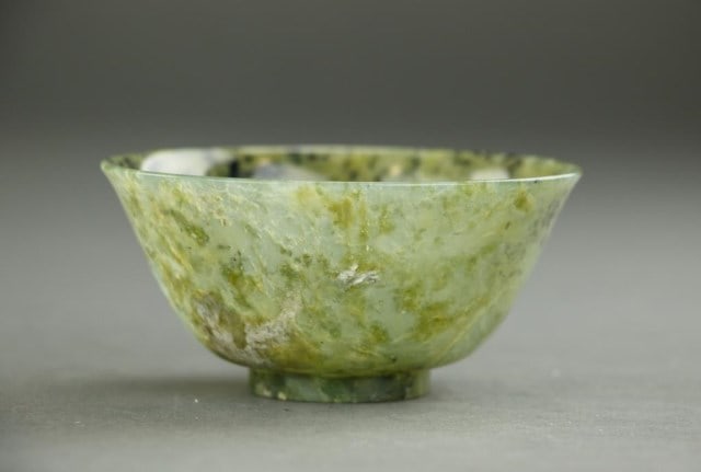 SPINACH JADE-COLOR NEPHRITE BOWL: Semi-translucent with mottled green colors all over. Diameter: 4 in.