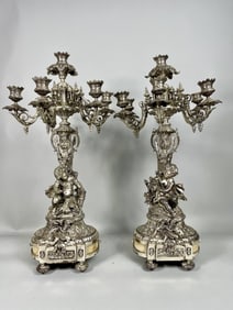 GRAND PAIR OF SILVER-PLATED SIX-LIGHT CANDELABRA