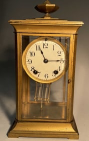 BRASS MANTEL CLOCK WITH HANGING PENDULUM