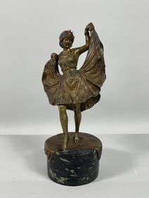 A COLD-PAINTED BRONZE FIGURE OF A DANCING LADY