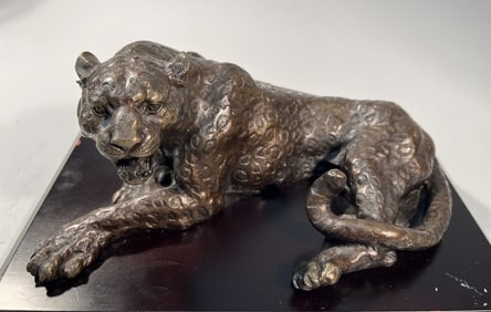 BRONZE FIGURE OF A JAGUAR ON A PLINTH
