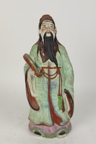 CHINESE PORCELAIN FIGURE OF A SCHOLAR