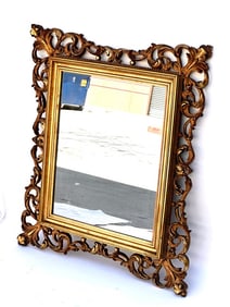RECTANGULAR MIRROR IN GILDED ORNATE FRAME