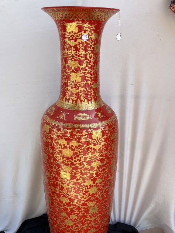 MASSIVE CHINESE GILDED AND PORCELAIN FLOOR VASE: H: 48in. With tall, elongated body tapering towards a recessed foot, rising to a structured shoulder and a tall, elegant neck terminating in a widely flared, trumpet-shaped rim. The exterior is lavish