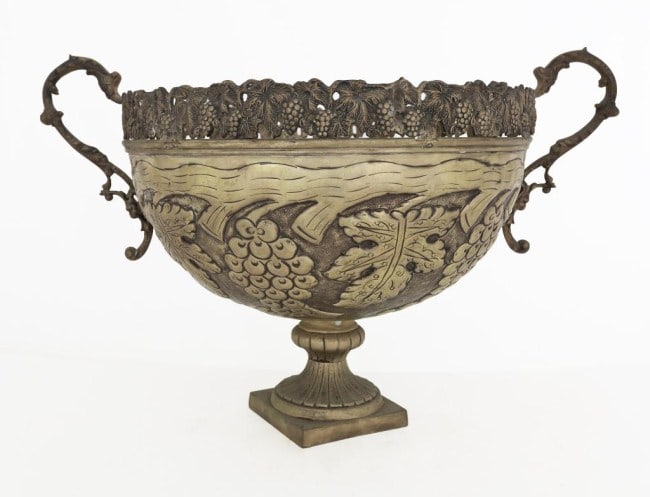 LARGE SPELTER CENTERPIECE BOWL: Decorated with a motif of grapes and vines all over. H: 14 in., D: 15 1/4 in.