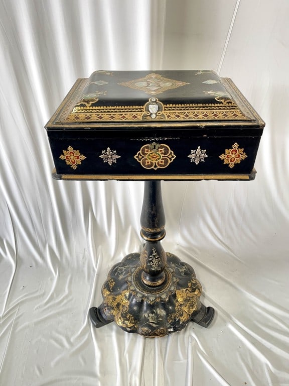 EUROPEAN LACQUERED SIDE TABLE W/ MOTHER-OF-PEARL: Beautifully decorated with gilt details all over, and the hinged cover opens up to compartments for storage. H: 28 1/2 in. L: 16 in. W: 12 1/2 in.