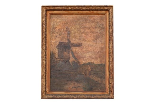 FRAMED PAINTING OF A WINDMILL: Giltwood framed, depicts a windmill in a rural town. Signature on bottom right which is illegible. H: 16 in. x W: 11 1/2 in.