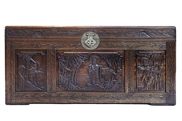 LARGE CHINESE WOODEN CHEST: Large Chinese wooden chest decorated with wooden relief of the Buddhist figure Guan Yin (Kannon) in Bamboo woods, attended by two other Bodhisattvas. L: 40 in. x W: 21 in. x H: 18 3/4 in.