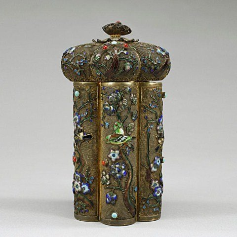 CHINESE SILVER FILIGREE BEJEWELED BOX: Chinese silver filigree bejeweled box decorated with porcelain and precious gem in lay birds and flowers. Lid is decorated with a matching style flowers. H: 6 1/2 in.
