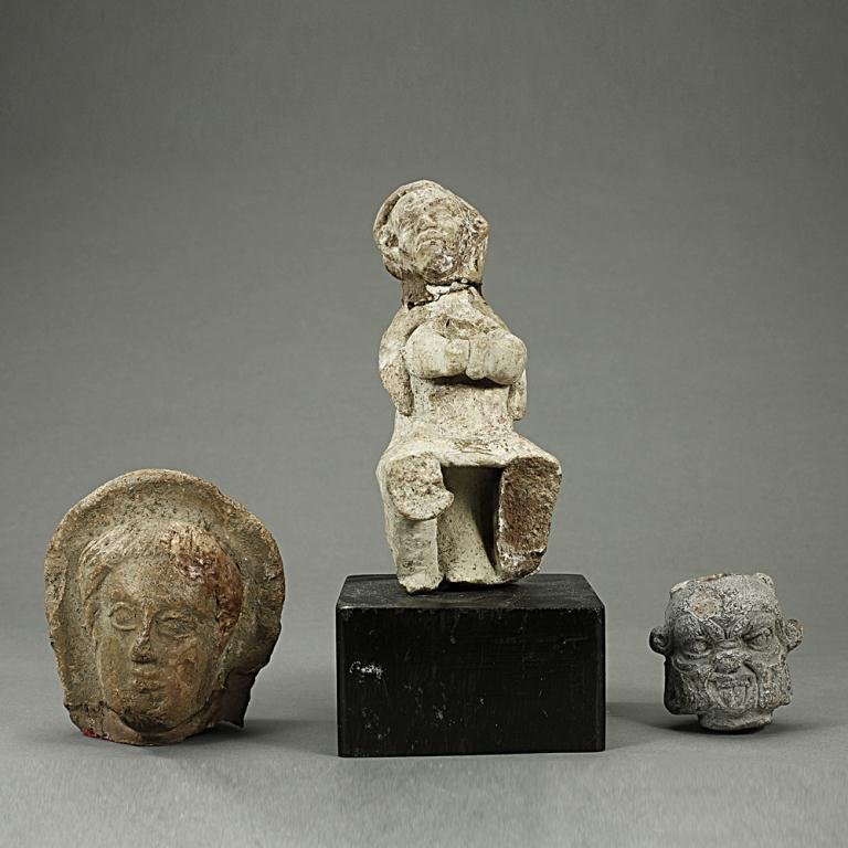 GROUP OF TERRACOTTA BUST AND FIGURES: From the British School of Archaeology in Egypt. H: 5 3/4 in.