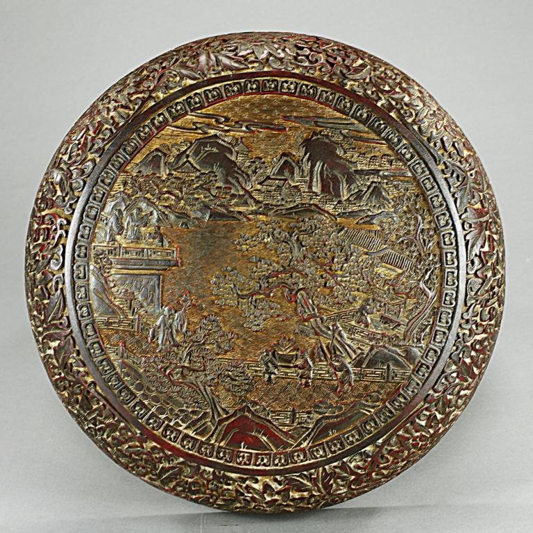 ANTIQUE CHINESE CINNABAR LACQUER BOX: Decorated with a medallion framed painting of landscape and retreat estate on the cover surface, encircling by a circular band of floral pattern. Mark at the bottom to read Zhengde period of the Ming 