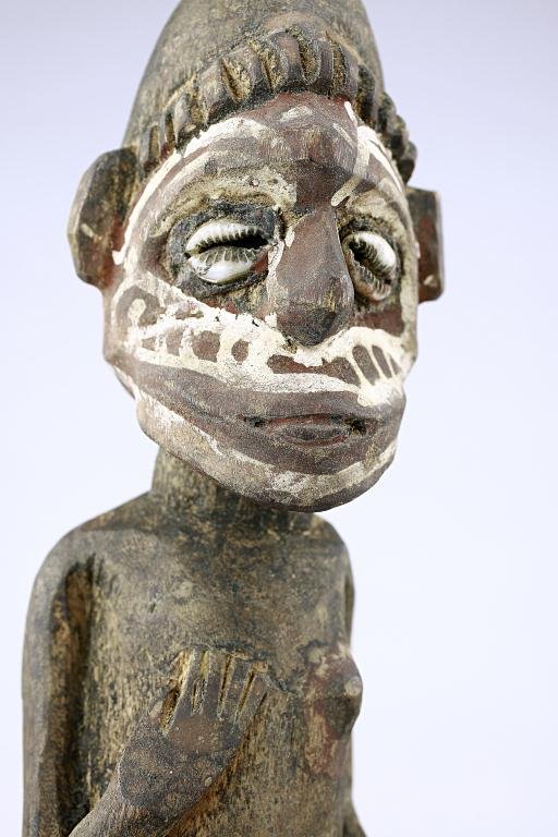 POLYNESIAN CARVED WOOD STATUE: H: 11in (28cm)
