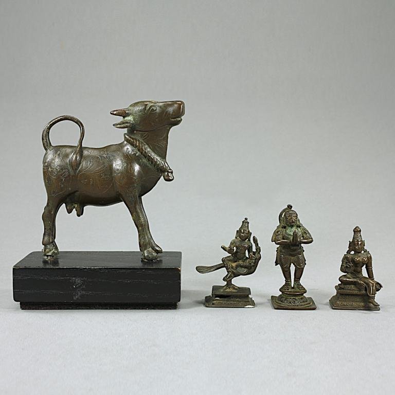 SET OF FOUR INDIAN BRONZES: Three Bronze Indian Buddhist figures and a sacred animal. H: 4 1/4 in. (Without the base) H: 5 3/8 in. (With the base)