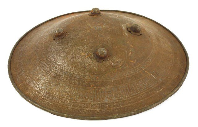 ROUND BRONZE SHIELD: With beautiful and intricate oriental pattern on the metal shield. D: 18 1/4 in.