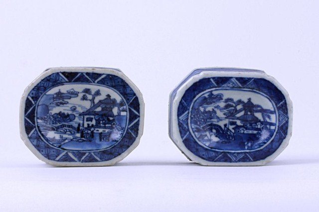 PAIR OF 18TH C. CHINESE BLUE & WHITE SALT DISHES: From the private collection of Harry Lawrence in Laguna Beach. Each salt dish is hand-painted with waves against port fence. Provenance: Excavated from Clipper ship, "Ontario" found in Indonesia. The 