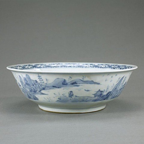 CHINESE BLUE AND WHITE SHALLOW BOWL: Featured by its pale tonality under a translucent glaze. Bottom of interior and sides of exterior painted with landscape scenes. Mark: Chenghua Period of the Ming Dynasty (1368 to 1644). D: 6 1/4 in. 