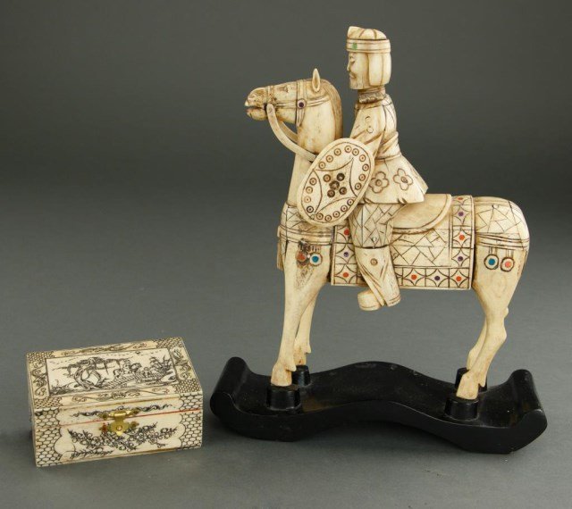 THREE ASSORTED CARVED ITEMS: Group comprising of an equestrian figure, carved box with lid, and pendant.