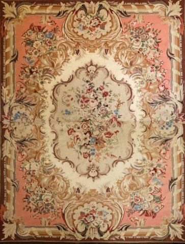 LARGE AUBUSSON TAPESTRY WITH FLORAL MOTIF: 20th century. Worked in a soft color palette. L: 104 in., H: 140 in.