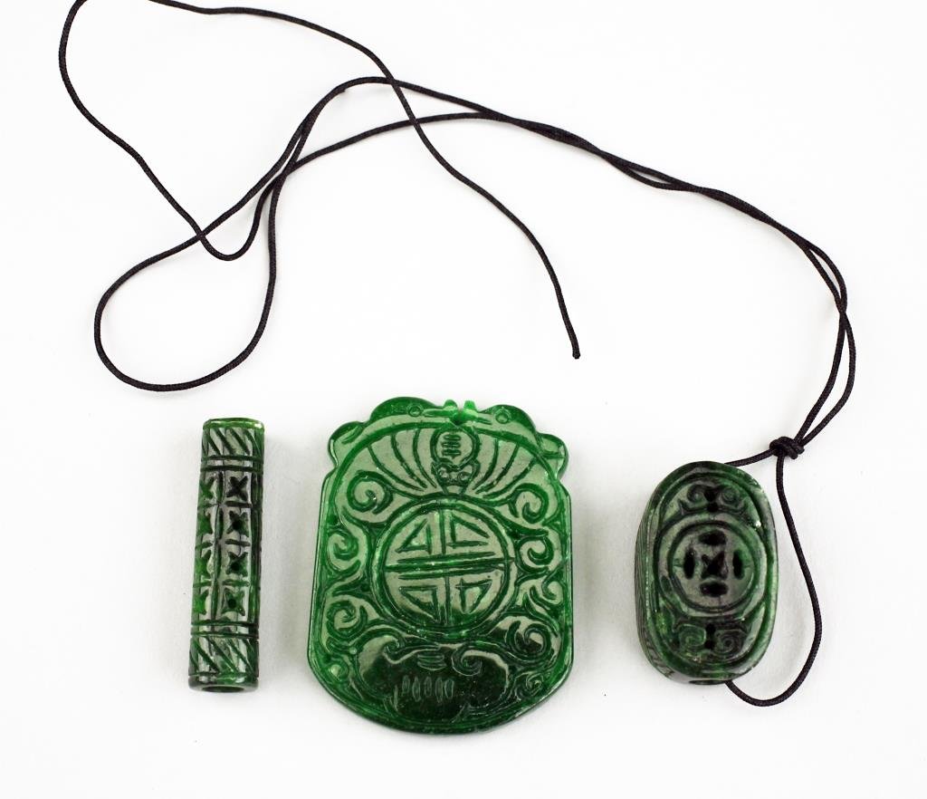 GROUP OF THREE CHINESE SPINACH JADE PENDANTS (1 of 2)