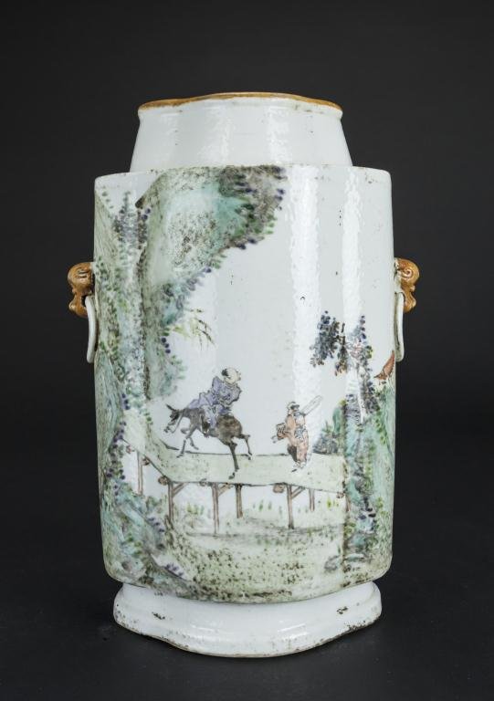 CHINESE LOBED VASE: With two creature head ring handles on two sides. One side of the vase decorated with a scholar and a child servant. The other side depicts a scene of a scholar riding a donkey with his servant. Mark 